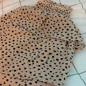 Beige polkadotted ruffle skirt.